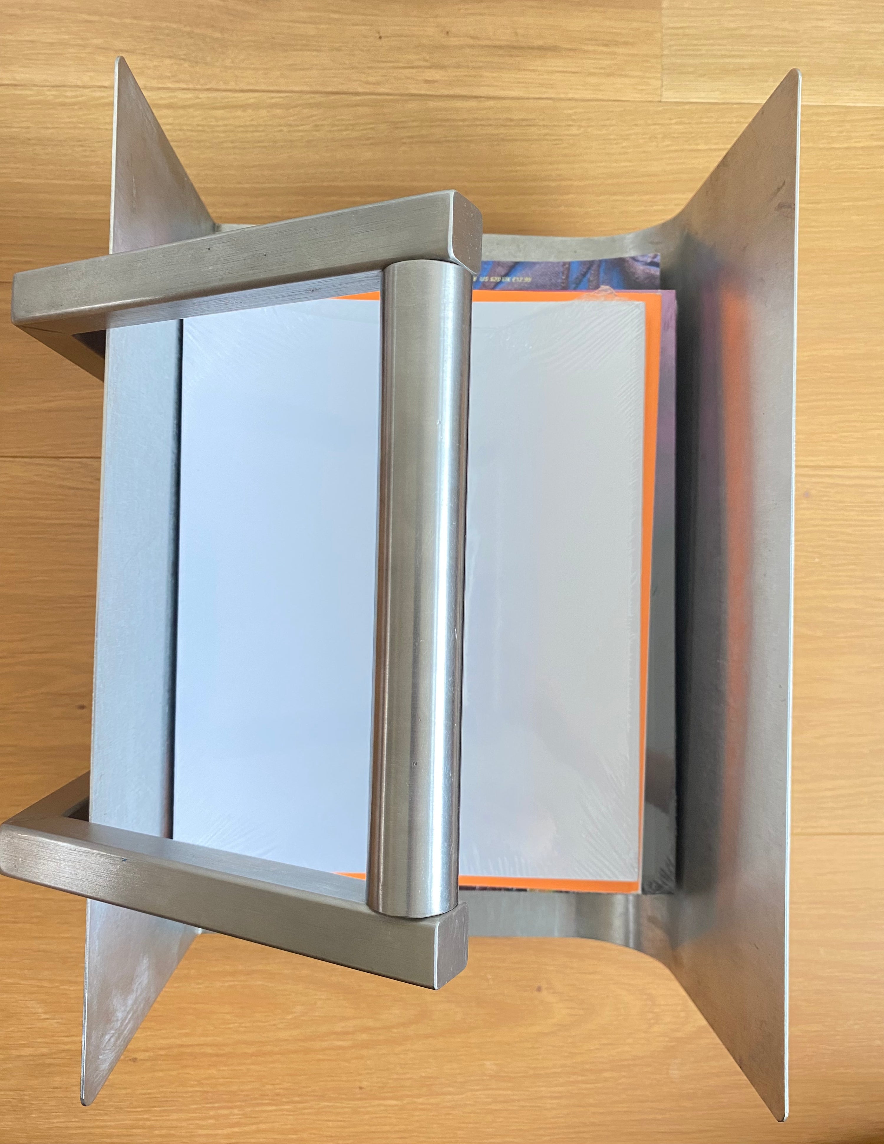 Metal magazine holder